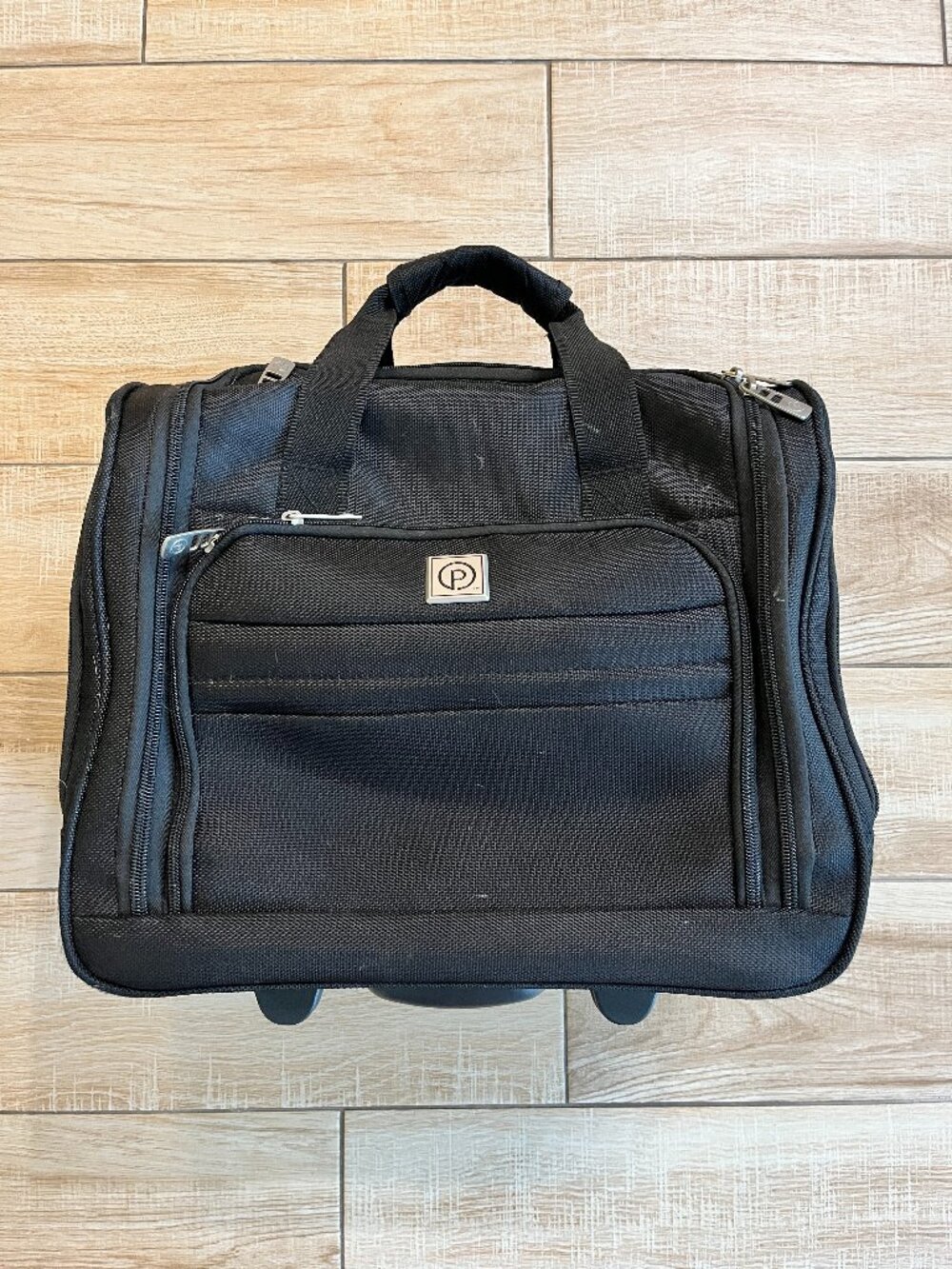 Protege Black Under Seat Luggage Roller